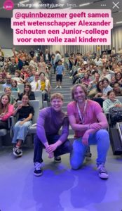 Quinn Bezemer and I posing before the lecture room.